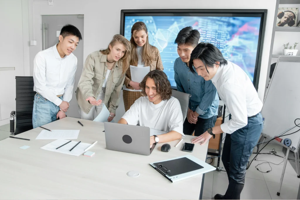 The Desmapp team working together on a client campaign